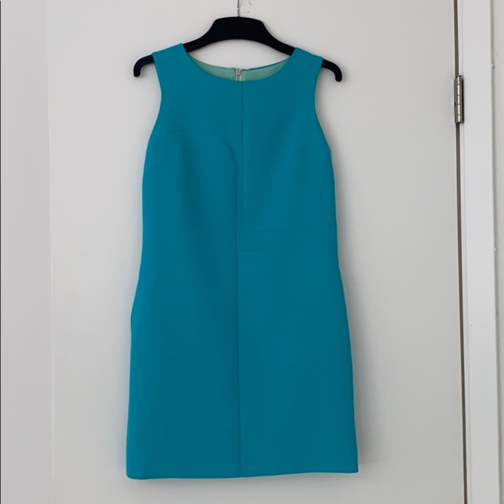 Dress size XS with side pockets, worn 1 time.